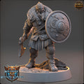 Viking figurine with shield and axe on a gray background Northmen miniature
