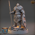 Warrior figurine with a spear and shield on a gray background, featuring 'Daybreak Miniatures' logo.Northmen miniature
